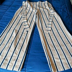 Mine women's black yellow and white striped pants size small